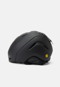 Schwarzer Skihelm mit glatter, matter Oberfläche, aerodynamischer Form, verstellbaren Belüftungsöffnungen und einem gelben MIPS-Aufkleber für zusätzliche Sicherheit.