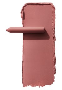 Un crayon à lèvres mat dans une teinte rose repose contre une éclaboussure de peinture assortie, avec une texture lisse et des bords doux, mettant en valeur une couleur cohérente.