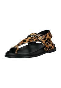 Sandali con stampa leopardata e suola nera, design open toe, fasce incrociate e fibbia metallica. Materiale morbido, profilo piatto per il comfort.