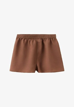 Smeđe pamučne kratke hlače s elastičnim pojasom i širokim krojem, dizajnirane za ležerno nošenje.