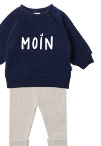 Navy blue sweatshirt with white text "MOIN" and a small chicken graphic; paired with light gray ribbed leggings. Soft cotton fabric.