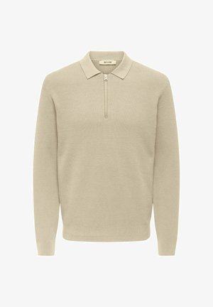 Pull en maille beige à manches longues avec col et fermeture éclair à l'avant, texture côtelée et manches avec bordures.