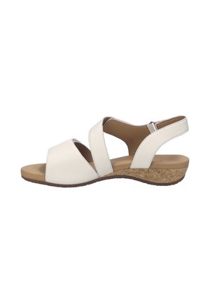 White women's open-toe sandal with two wide straps, adjustable back strap, cushioned footbed, and low cork wedge heel.