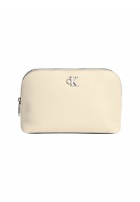 Pochette cosmetica in pelle crema con parte superiore arrotondata, hardware in argento e logo impresso. Texture liscia e design minimalista. Chiusura con zip.