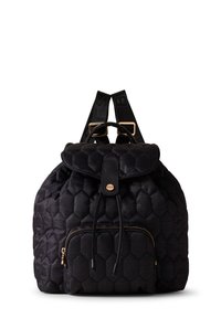 Black backpack with hexagonal textured fabric, drawstring closure, front zip pocket, and gold-tone hardware. Adjustable straps featured.