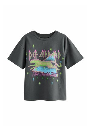 Szürke pamut póló, színes grafikai nyomattal, kutya sziluettel, csillagokkal és a "Def Leppard The World Tour 1987" szöveggel.