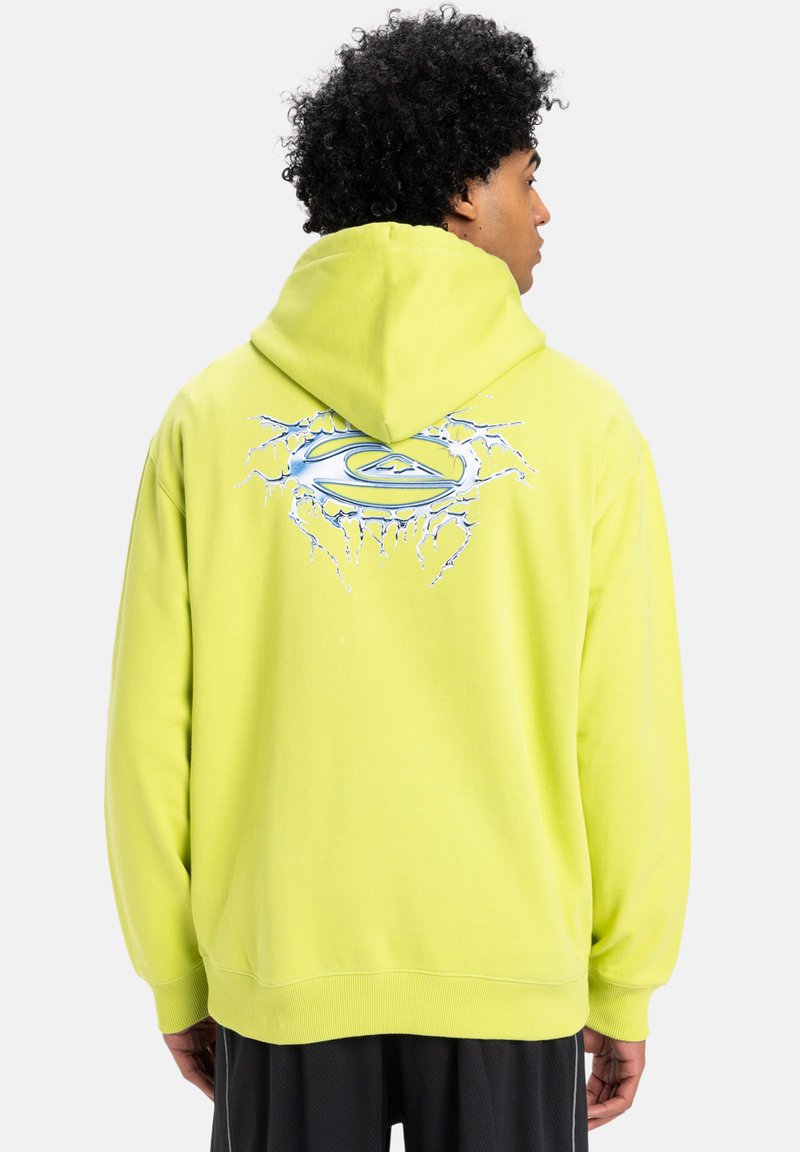 Bright yellow hoodie with a hood, featuring a stylized blue logo surrounded by crack designs on the back. Soft fabric texture.