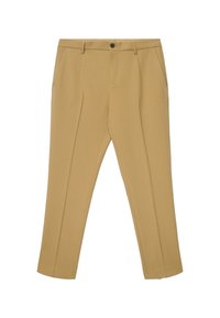 Pantalon beige sur mesure en tissu lisse, avec devant plat, passants de ceinture, poches latérales et fermeture à un bouton.