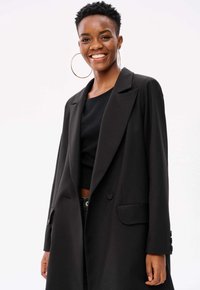 blue shadow ALMERIA - Halflange jas - black