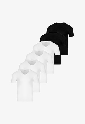 Pięć gładkich T-shirtów z krótkim rękawem, trzy białe z dekoltem w serek z przodu, za nimi dwa czarne T-shirty z okrągłym dekoltem.