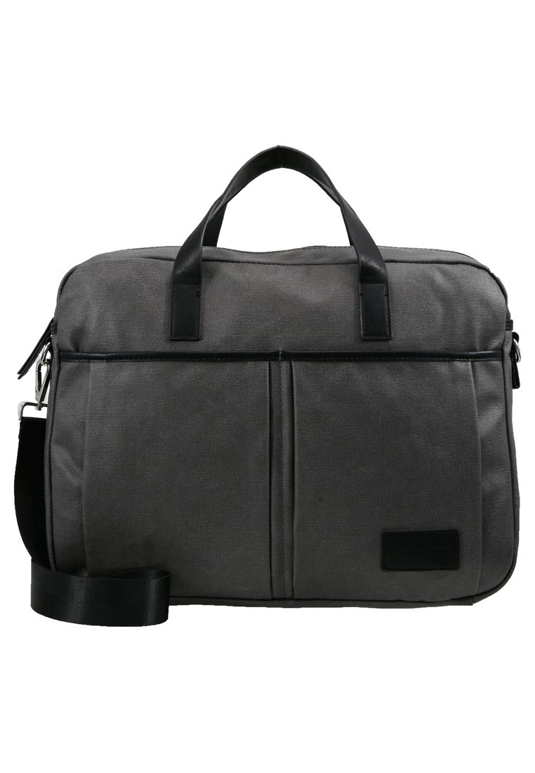 Grå canvas laptop taske med sorte læderdetaljer, udstyret med dobbelte håndtag, justerbar skulderrem og to frontlommer.