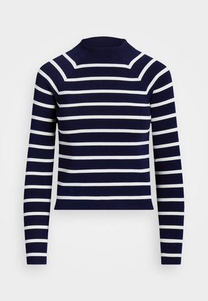 Pull bleu marine avec des rayures blanches horizontales, manches longues et col montant.