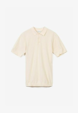 Lys beige polo skjorte lavet af tekstureret stof, med krave, tre-knaps stolpe og korte ærmer.