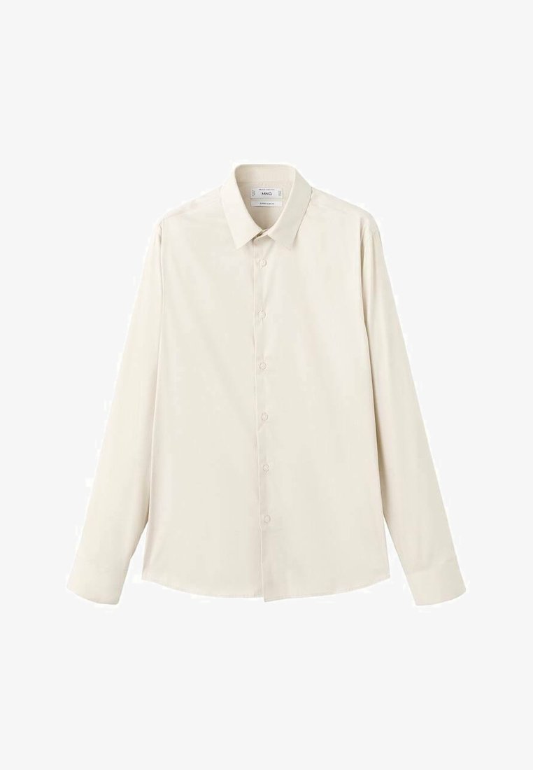Chemise beige clair à manches longues en tissu lisse, dotée d'un col classique, d'une fermeture par boutons et d'une coupe décontractée avec un ourlet arrondi.