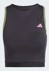 Crop top de sport noir en tissu extensible, avec des accents vert fluo sur les côtés, un col rond et une bande logo noire en relief en bas.