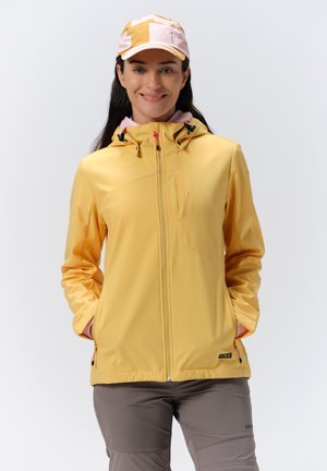 Yellow lightweight outdoor jacket with a full zipper, adjustable hood, and pink accents. Paired with gray pants.