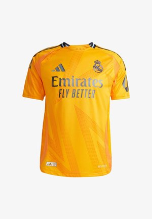 Maglia sportiva gialla brillante con "Emirates Fly Better" in testo argentato, con accenti neri e un motivo geometrico. Realizzata in tessuto tecnico.