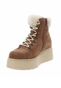 Stivale in suede marrone con colletto in pelliccia sintetica, lacci bianchi, cerniera laterale e suola piatta spessa beige. Presenta occhielli metallici e dettagli.