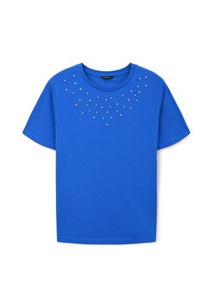 T-shirt in cotone blu con scollo rotondo, maniche corte e dettagli metallici disposti in un motivo a gradiente sulla parte anteriore.