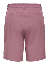 Lilla shorts med elastik i taljen, diskrete syninger bagpå og en lille stofsløjfe ved taljen.