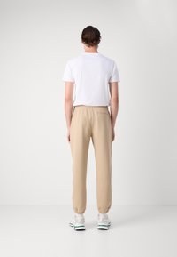Lacoste Jogginghose - viennese