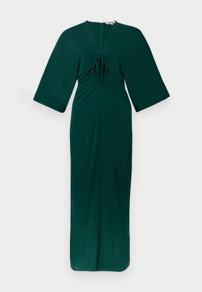 Zelena maxi obleka iz gladkega blaga, z globokim izrezom, detajlom kravate spredaj in širokimi rokavi, s pravim krojem in dolžino do gležnjev.