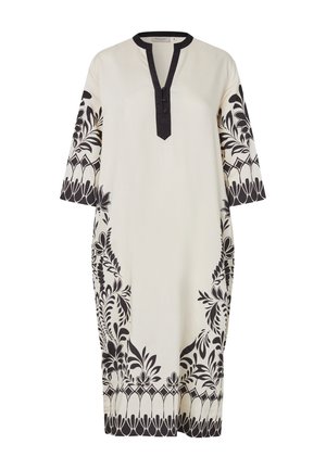 Crème knielange jurk met zwarte bloemen- en geometrische randprints, driekwart mouwen en een V-hals met zwarte rand en knoopdetails.