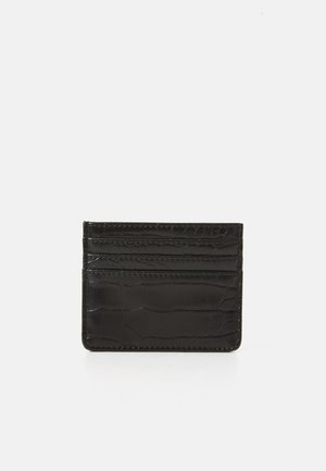 Black cardholder with crocodile texture and four visible card slots on a white background.