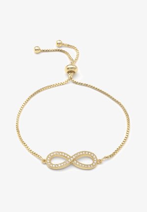 Bracelet réglable en or avec un symbole d'infini incrusté de petites pierres claires sur fond blanc.