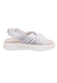 Białe sandały z błyszczącymi, opalizującymi paskami i miękką wkładką. Zamknięta pięta z regulowanym paskiem na obcasie. Gruba, biała gumowa podeszwa.