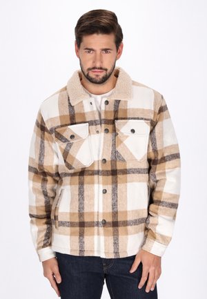 - Kurtka przejściowa