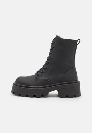 Botines con plataforma - black