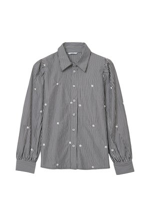 Schwarz-weiß gestreifte, langärmlige Bluse mit Puffärmeln und kleiner weißer Blumenstickerei, die über den Stoff verteilt ist.