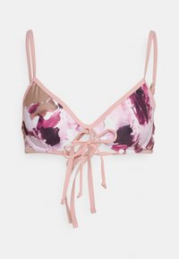 Sutiã com um padrão floral em tons de rosa e roxo, com um tecido suave, copas triangulares e alças ajustáveis com um laço na frente.