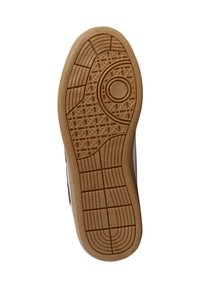 Suola di scarpa in gomma con un design a motivo, caratterizzato da scanalature e un accento circolare; colore sabbia con una superficie testurizzata per una maggiore aderenza.