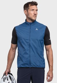 Blaues ärmelloses Vest aus leichtem Stoff, mit hohem Kragen, Frontreißverschluss und zwei Seitentaschen. Minimales Logodesign.