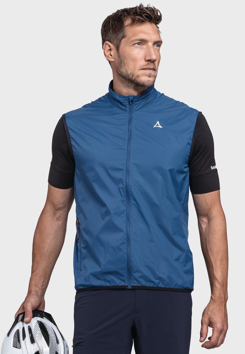 Blaues ärmelloses Vest aus leichtem Stoff, mit hohem Kragen, Frontreißverschluss und zwei Seitentaschen. Minimales Logodesign.