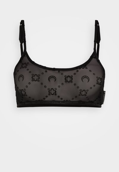Mustmust läbivõrguga bralette, millel on lille- ja poolkuu tikandid, reguleeritavad rihmad ning pehme elastne pael allservas.