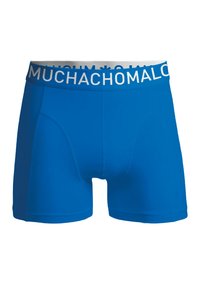 Férfi boxeralsó élénk kék színben, fehér elasztikus derékrésszel, amelyen a "MUCHACHOMALO" felirat látható. Sima anyag, testhezálló fazon, minta nélkül.