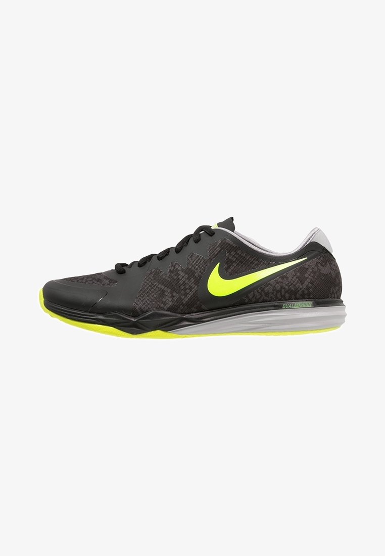 Chaussure de course Nike noire et jaune néon avec tige en tissu à motifs, design à lacets et semelle grise Dual Fusion.