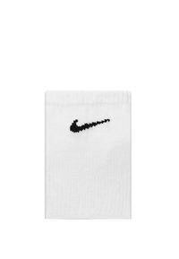 Calzino bianco in cotone con logo Nike ricamato in nero sulla parte anteriore. Superficie liscia e parte superiore a coste per una vestibilità sicura.