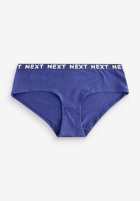 Slips di cotone viola con una fascia elastica bianca che presenta il testo ripetuto "NEXT." Cuciture piatte e assenza di motivi visibili esaltano il design.