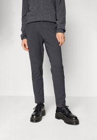 Calvin Klein Tygbyxor - mottled dark grey