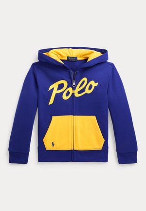 Niebieska bluza z zamkiem błyskawicznym, z żółtym podszyciem kaptura, żółtymi kieszeniami z przodu i żółtym logo „Polo” na piersi.