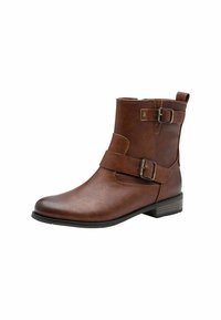 Bota de piel marrón hasta el tobillo con dos correas de hebilla, puntera redondeada y tacón bajo apilado. Textura suave con un sutil detalle de grano.