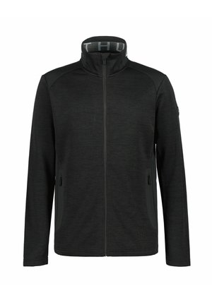 Chaqueta negra con cremallera completa, cuello alto y bolsillos laterales con cremallera, fabricada en tela texturizada, mostrada sobre un fondo blanco.