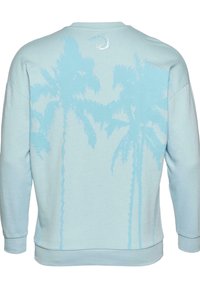 Light blue sweatshirt featuring a palm tree silhouette pattern on the back, with ribbed cuffs and hem, made from soft fabric.