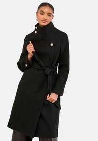 REGULAR FIT - ASYMMETRICAL FUNNEL NECK BELTED - Cappotto classico - black