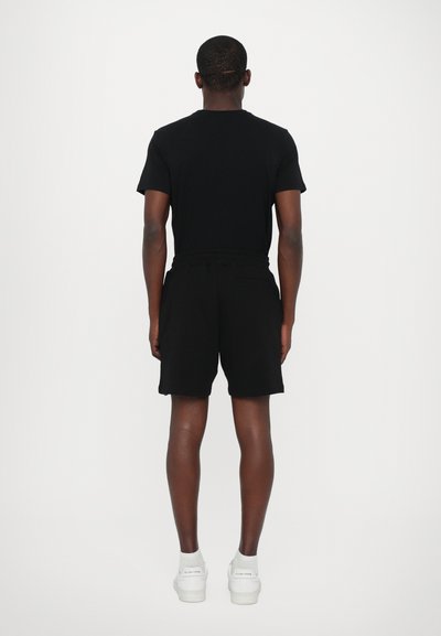 Les Benjamins Παντελόνι φόρμας - black