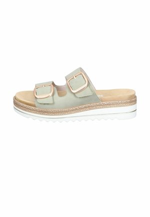 Light green slip-on sandal with two adjustable buckled straps, beige cushioned footbed, woven detail midsole, and white ridged outsole.